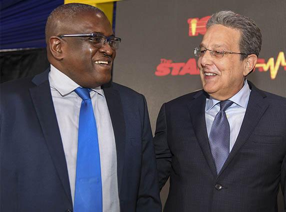 RJRGLEANER Communications Group representatives at a company event